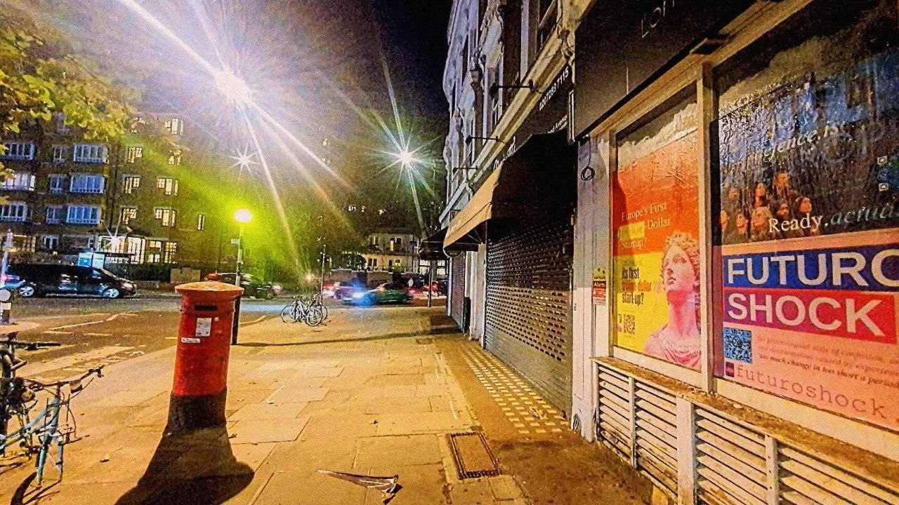 Poster pasted on a London hoarding, 13 July 2026